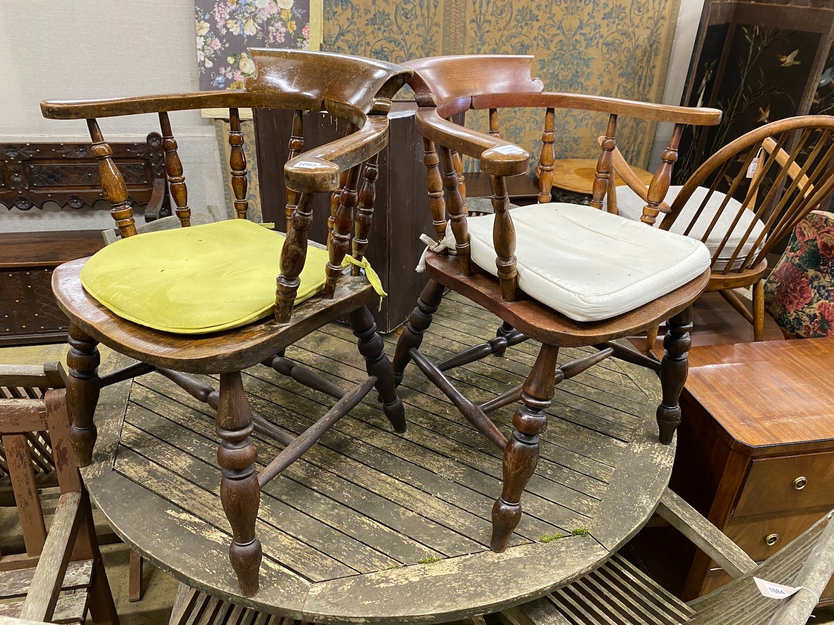 Two similar late Victorian turned beech Windsor smoker’s bow chairs, width 69cm, depth 50cm, height 80cm